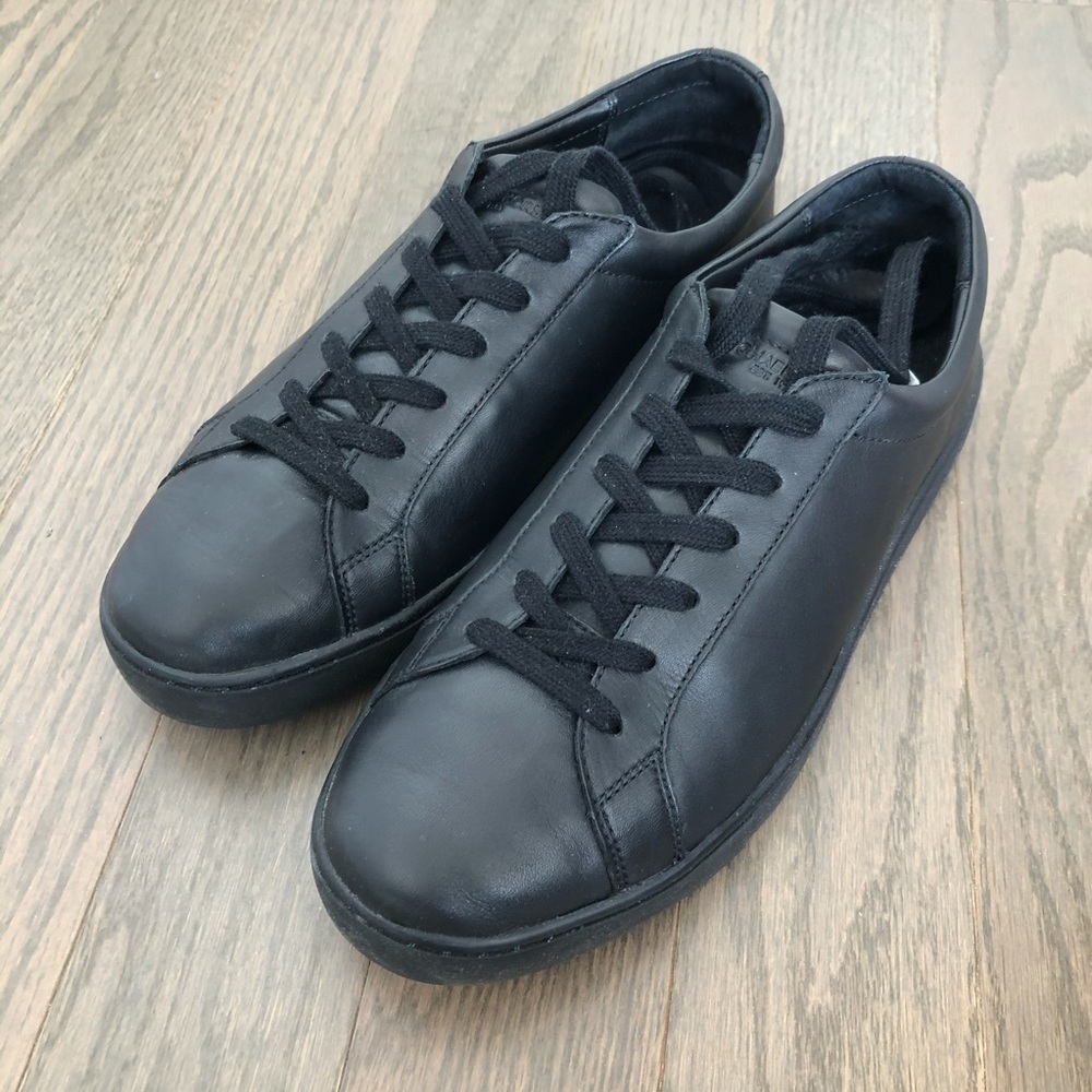 Black leather sneakers by Michael Kors